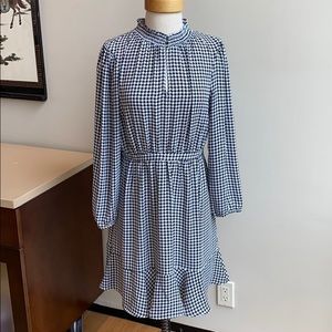 J Crew houndstooth dress with ruffled trim.